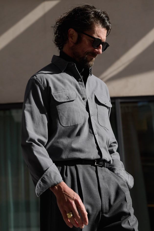 Man wearing warm casual shirt on the street