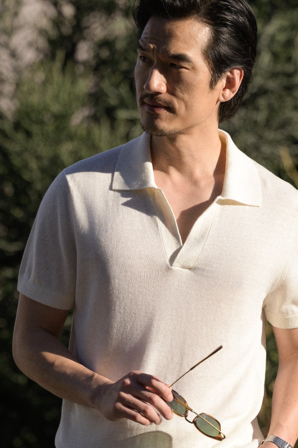 Man wearing a lightweight knit polo