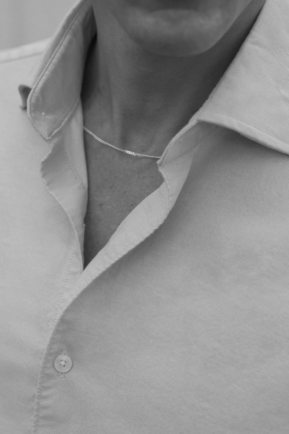 Man wearing lightweight shirt.