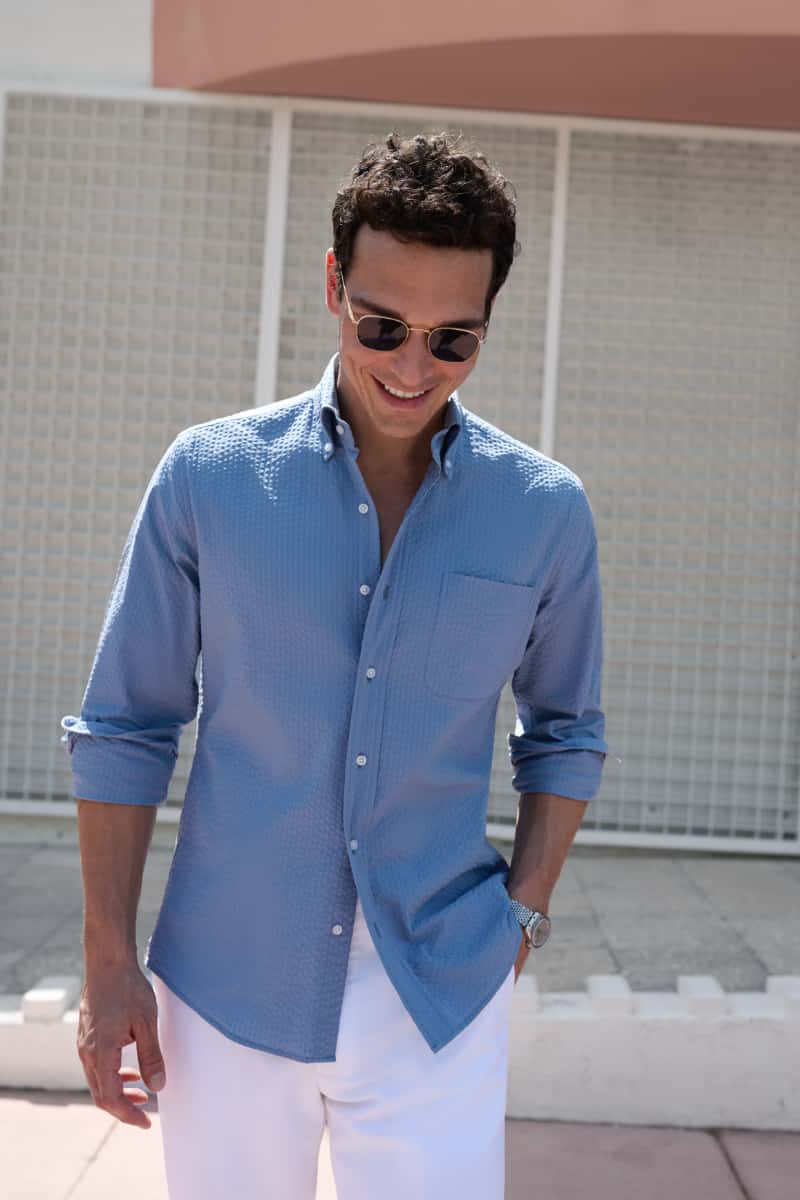 Man wearing seersucker button up shirt