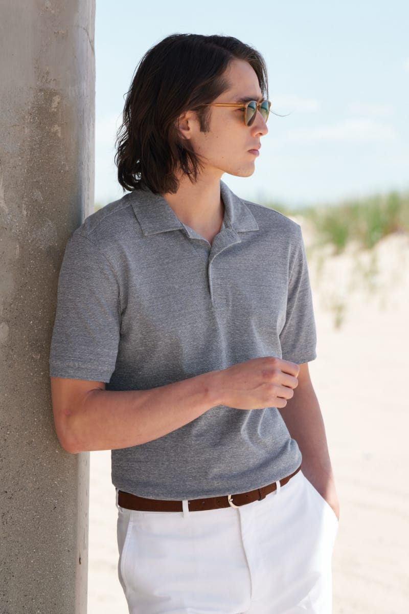 Man wearing knit polo shirt