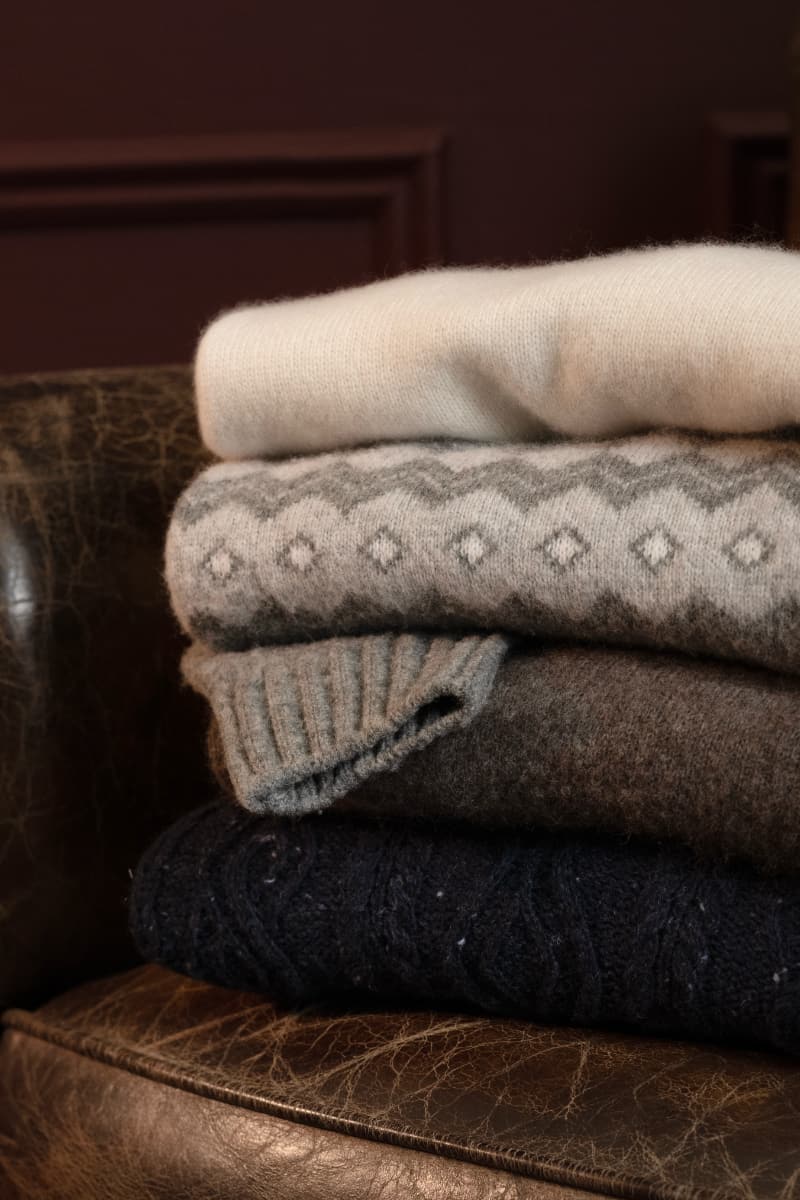 Man wearing a blue oxford cloth button down shirt.