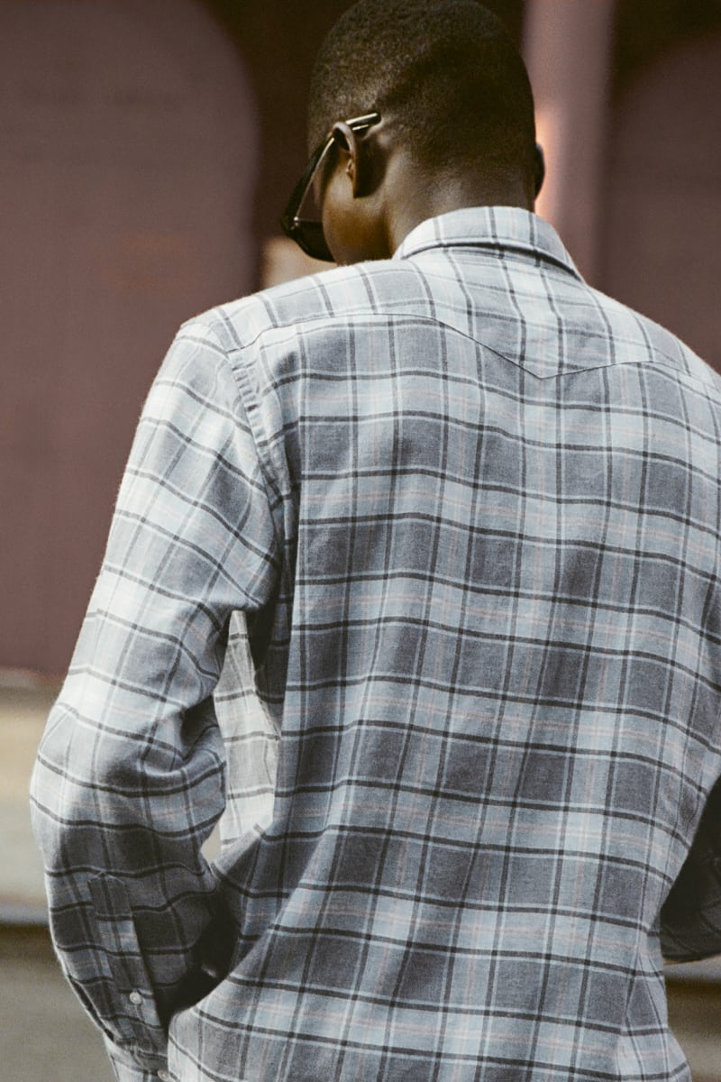 Man wearing casual plaid shirt