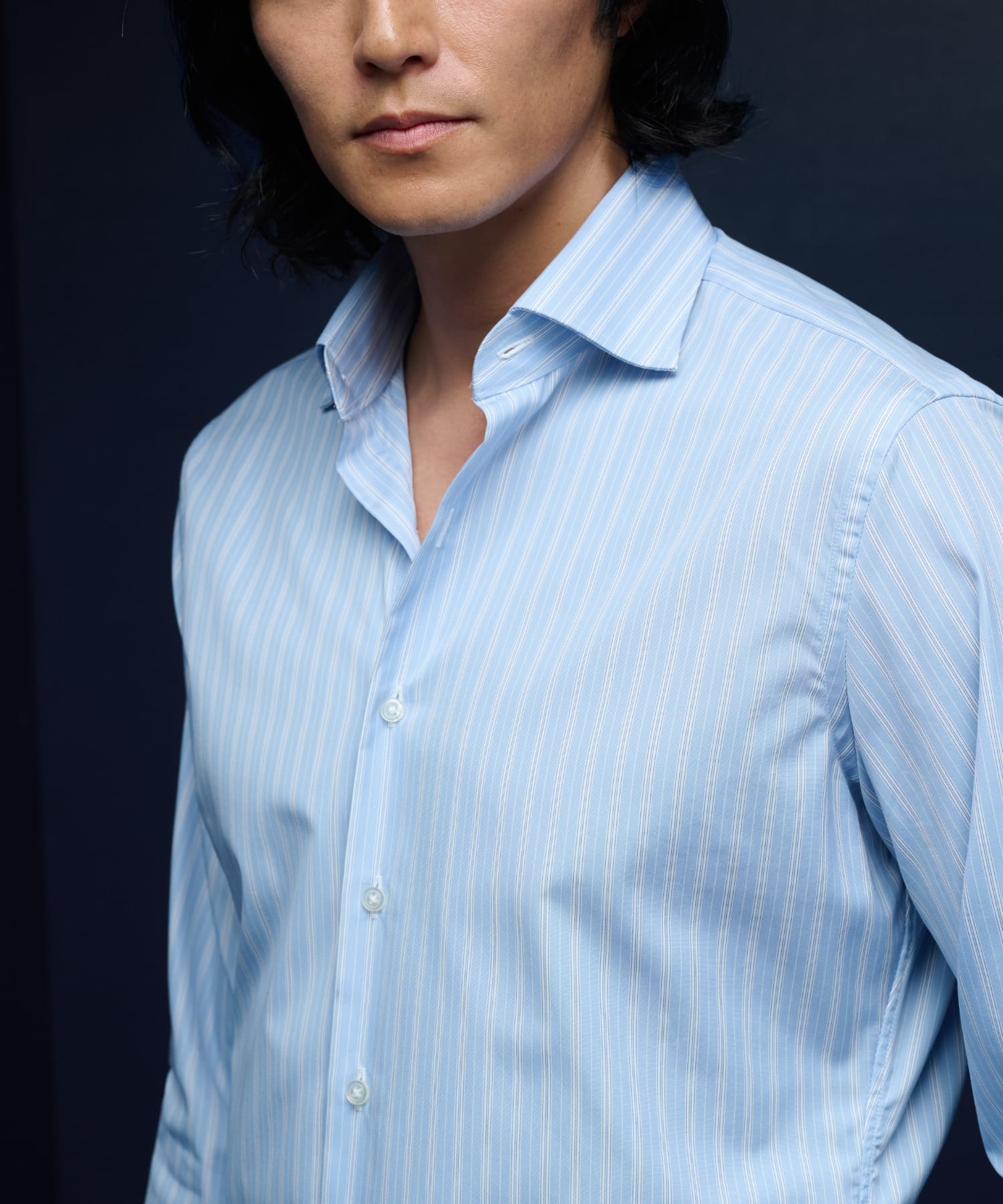 Man wearing a checked wrinkle-resistant custom dress shirt