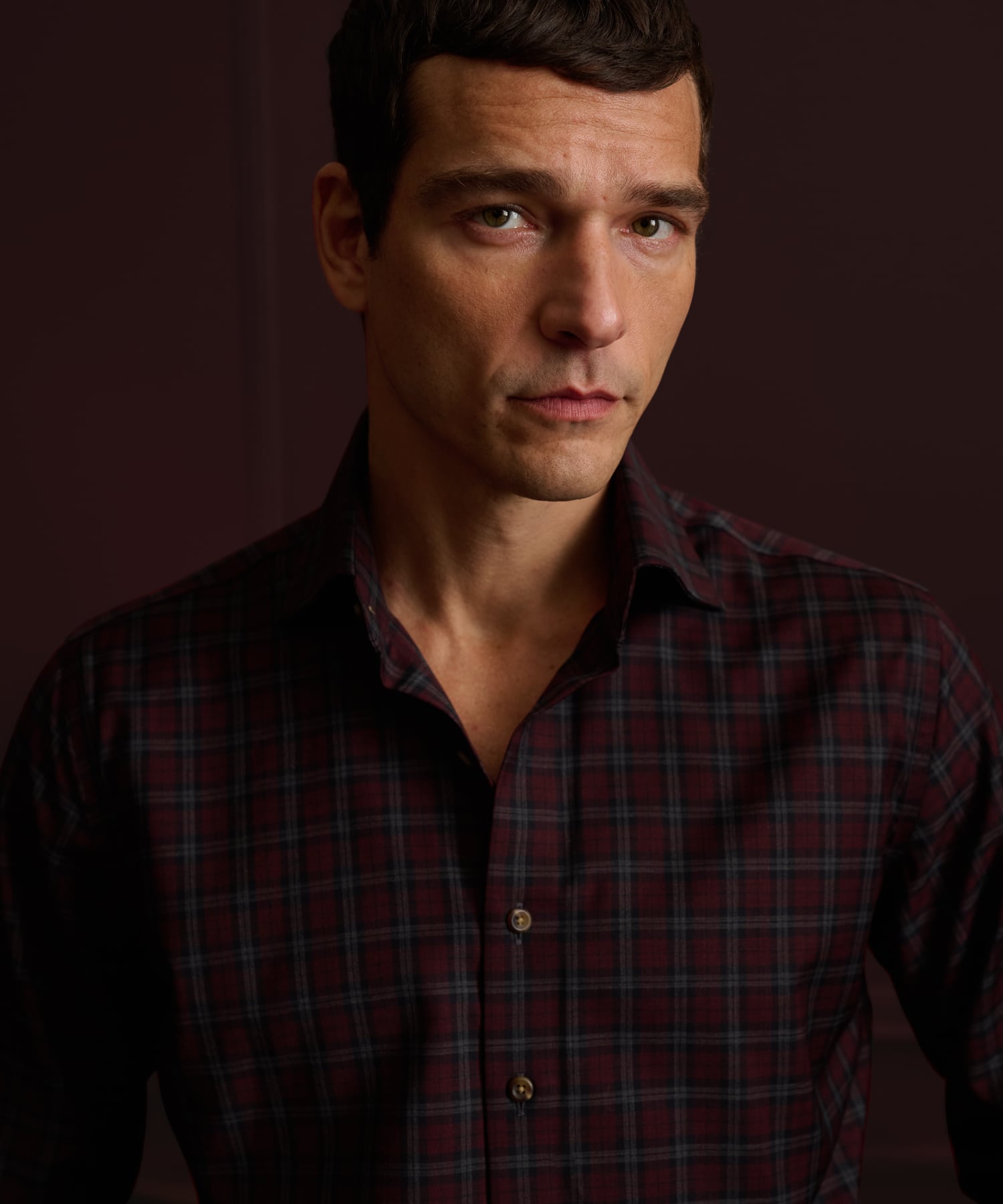 Man wearing a checked wrinkle-resistant custom dress shirt