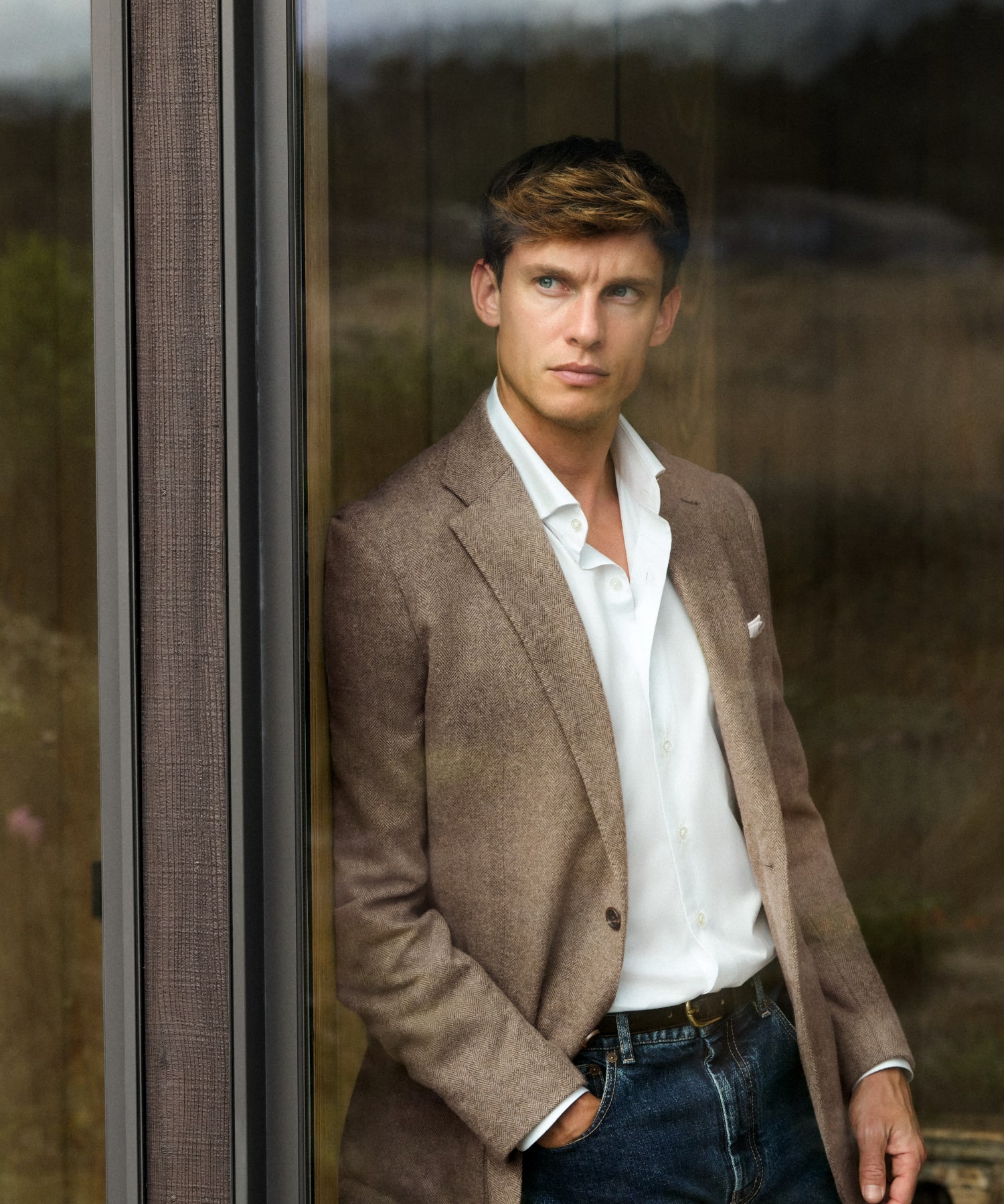 Man wearing a blue check custom dress shirt