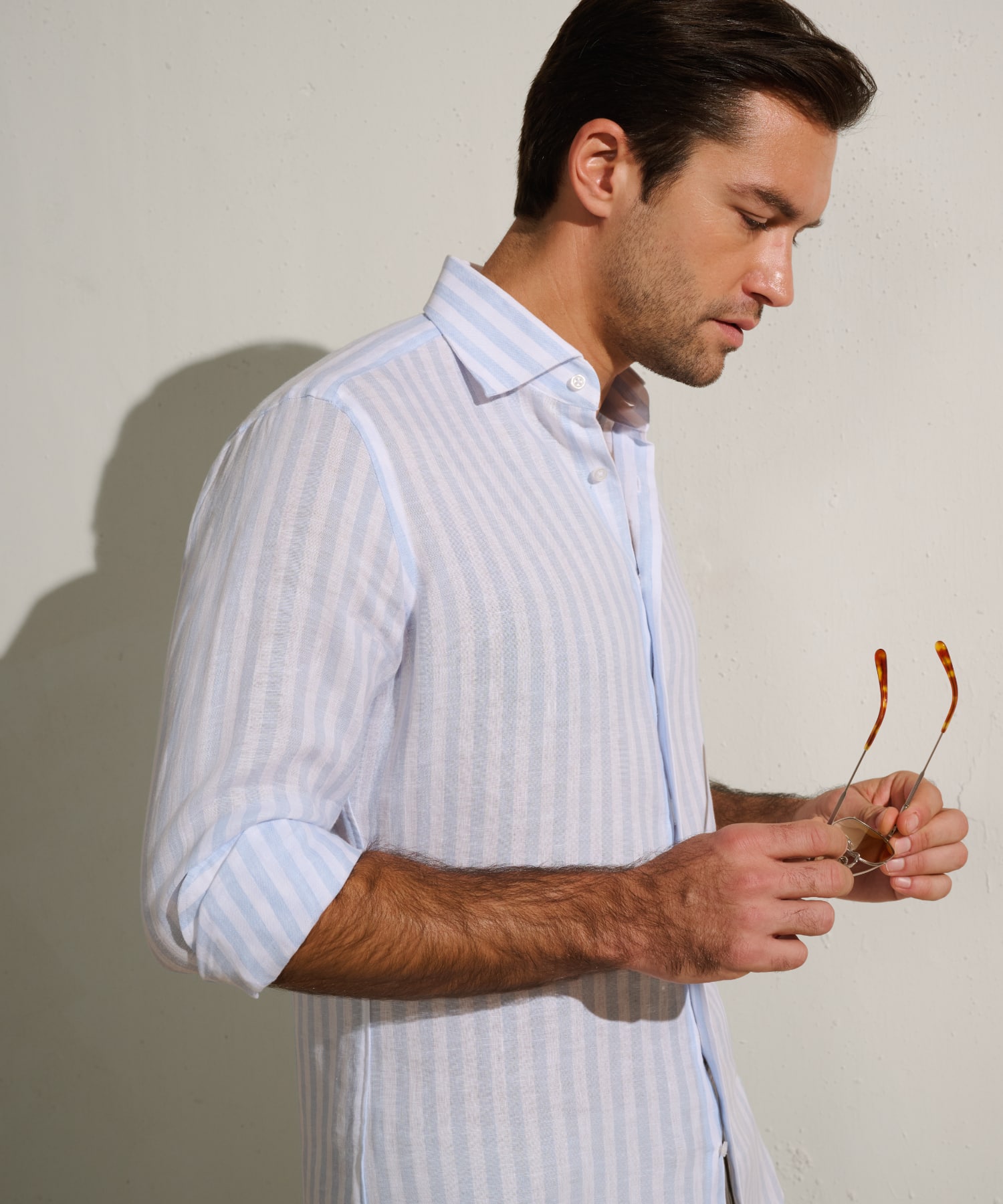 Man wearing a checked wrinkle-resistant custom dress shirt