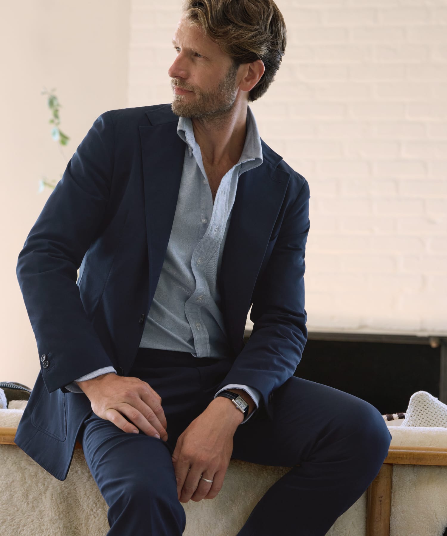 Man wearing a classic navy suit