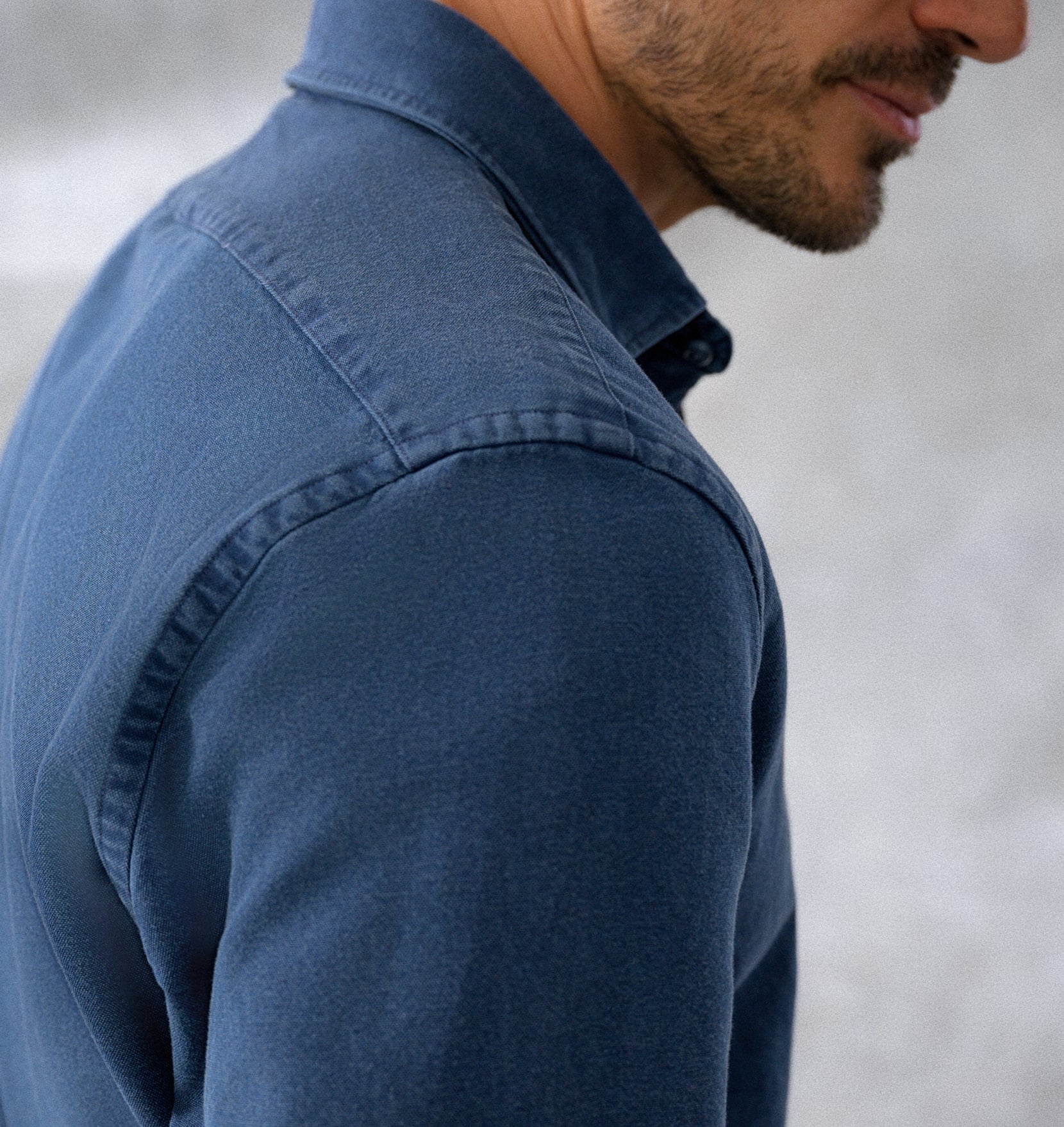 Closeup image of garment washed custom indigo shirt