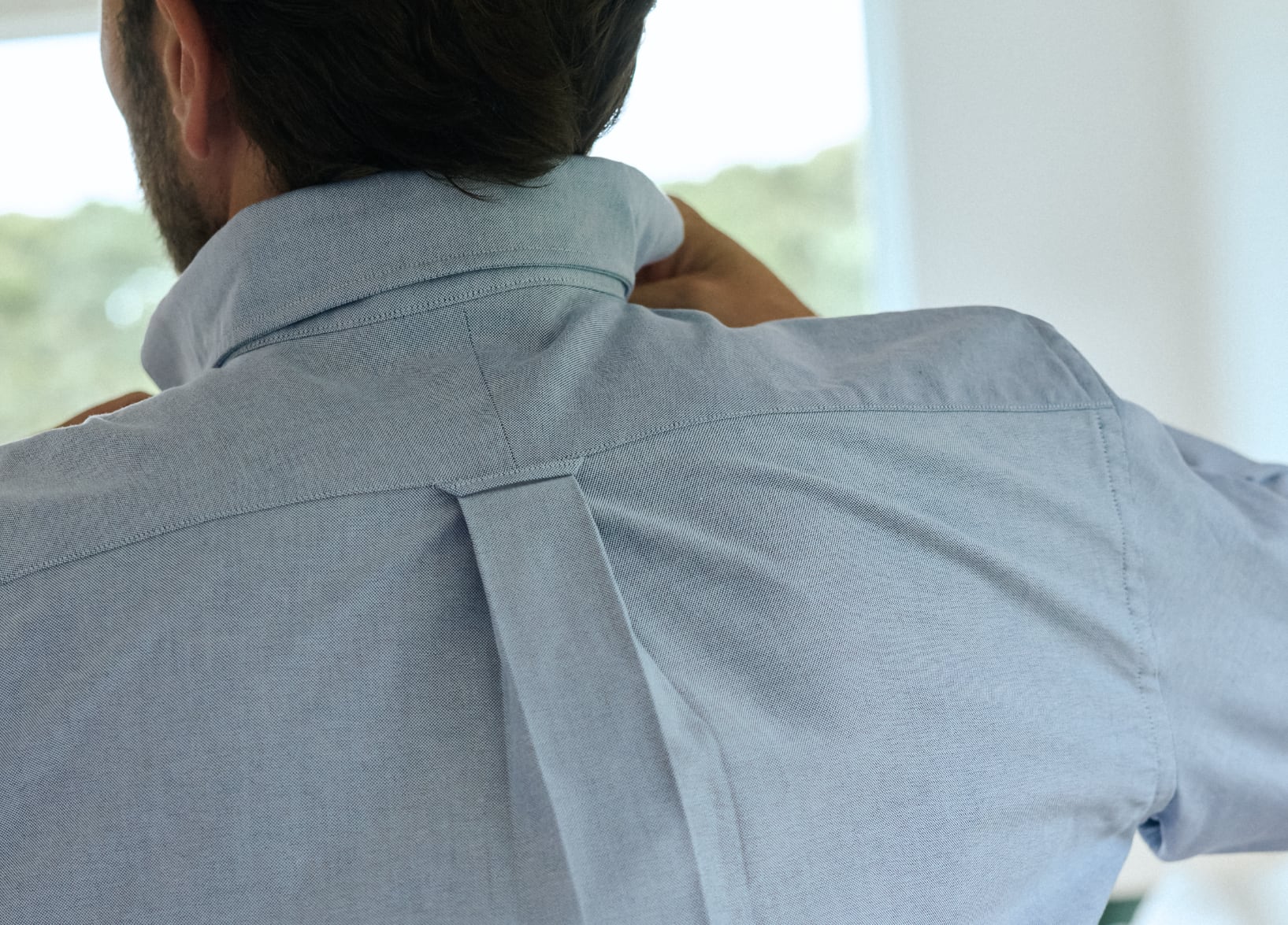 Detail photo of locker loop on an oxford shirt