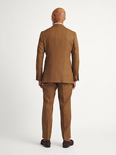 men's tobacco suit Brown Neo Cut button front closure with notch lapel Structured shoulders with a clean modern silhouette Double vent back for ease of movement Interior welt pockets 100% Pure Wool breathable Tobacco Brown Flannel Suit