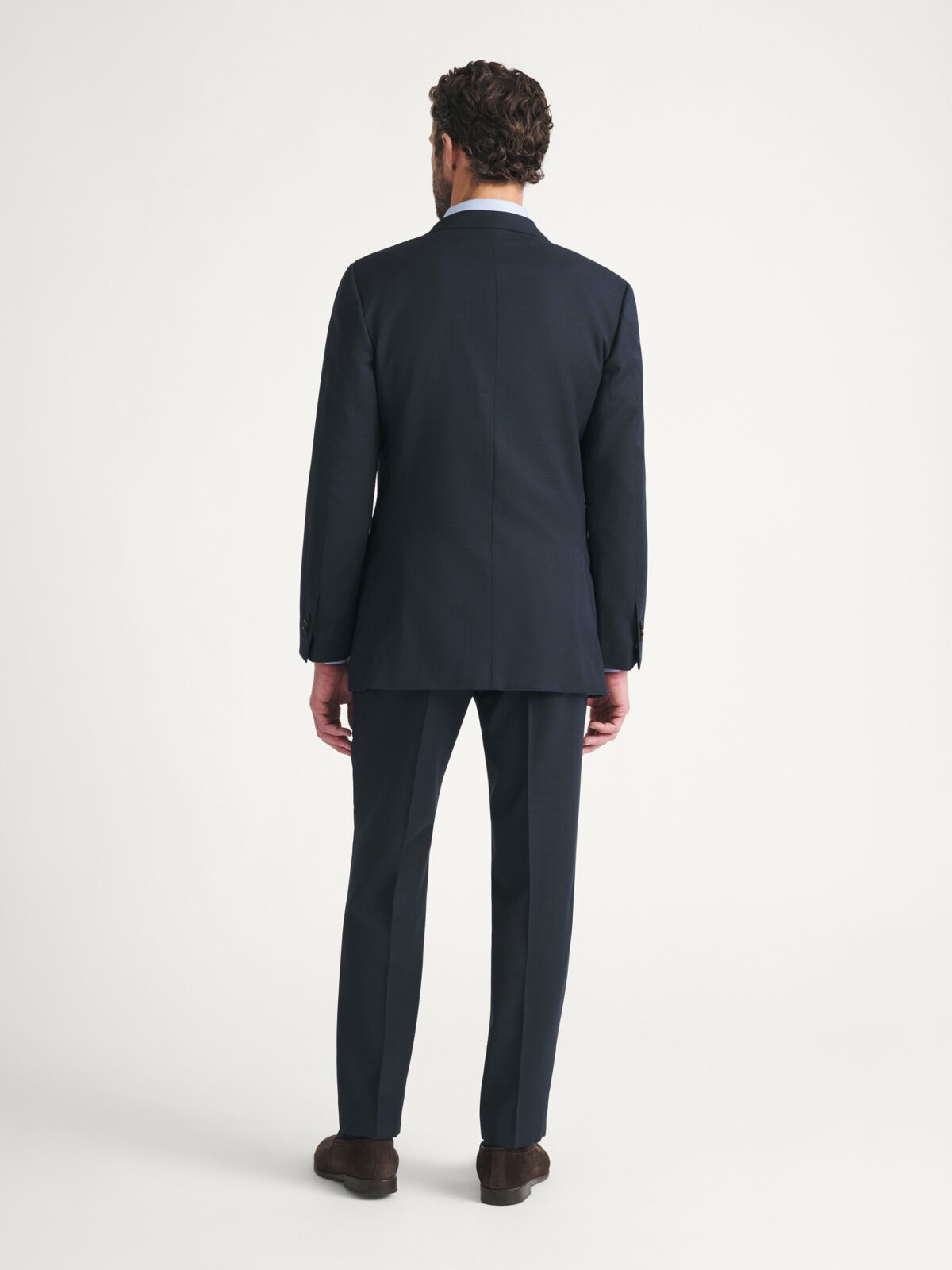 dress shirt for navy suit with White and Floral Boutonniere This suit comes in our signature athletic fit that rewards those with an athletic physique. Want To Know How To