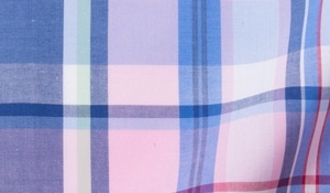 Fabric swatch of Pink Blue Red Madras Fabric